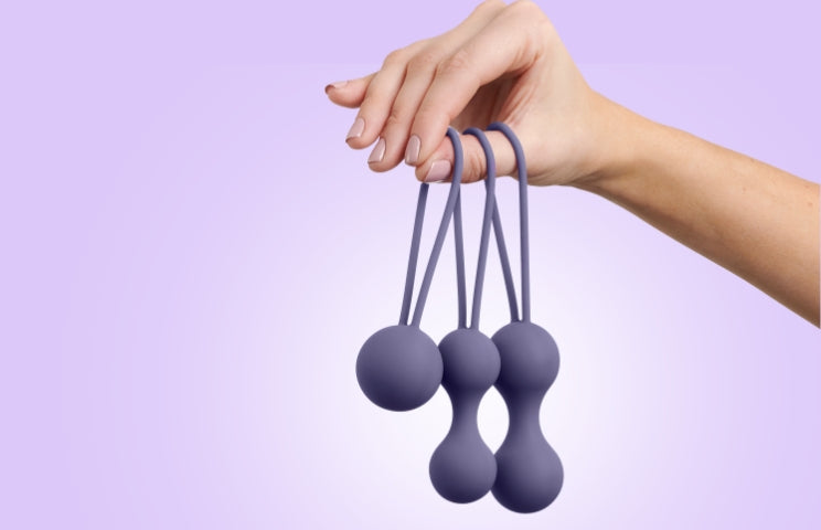So Divine Kegel Ball Set held in hand